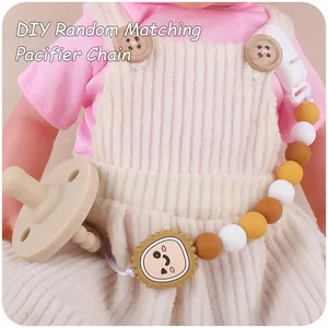 Detailed view of DIY silicone baby pacifier chain with cartoon lion charm and beads