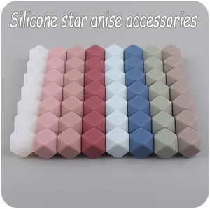 Flat lay of 14mm octagonal food-grade silicone beads in various muted colors for DIY crafts