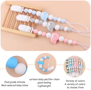 Detail of food grade silicone pacifier clip with cartoon whale and Morandi color beads