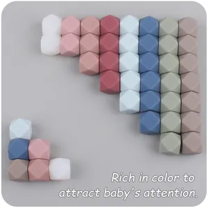Macro shot of 14mm hexagonal silicone beads in Morandi colors for DIY baby teethers