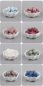 Macro view of 14mm octagonal silicone beads in various colors for DIY baby pacifier clips