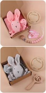 Pink and grey baby gift set featuring rabbit security blanket and silicone pacifier clip