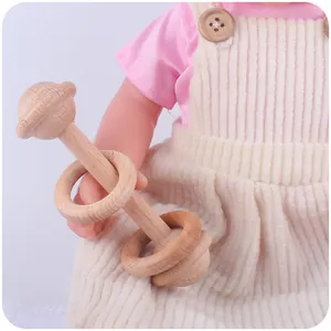 Hochet bébé en bois de hêtre naturel avec deux anneaux pour l'éveil et la préhension
