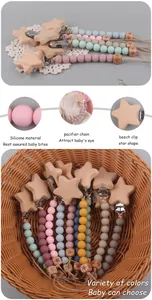 Detail of silicone pacifier clip with beech wood star and colorful macaron beads