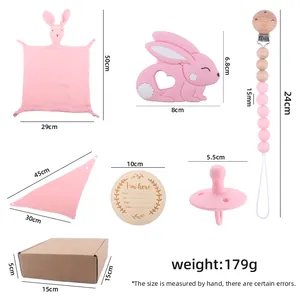 Baby gift set with rabbit security blanket, silicone teether and pacifier clip in pink
