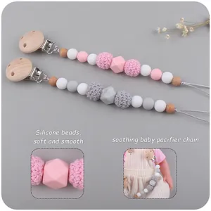 Set d'attaches tétines bébé rose et gris avec bois de hêtre, perles silicone et hochet étoile