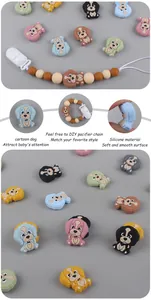 Détail de perles en silicone en forme de chien pour chaînes de tétines de dentition
