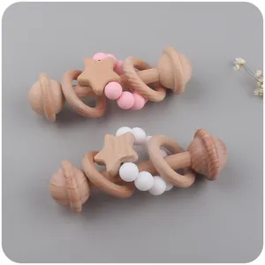 Hochet bébé en hêtre avec perles en silicone et pendentif étoile rose et blanc