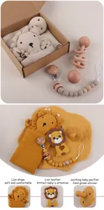 5-piece baby lion gift set including cotton comforter, silicone teether and wood rattle