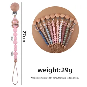 Handgefertigte Schnullerkette mit Silikonperlen und Buchenholzring 27cm für Babys
