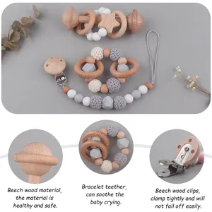Set de dentition pour bébé en hêtre avec attache-tétine, hochet et bracelet en silicone