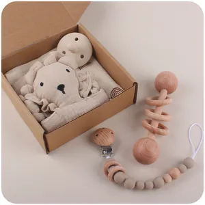5-piece baby lion gift set with wooden rattle, silicone pacifier, and cotton plush toy