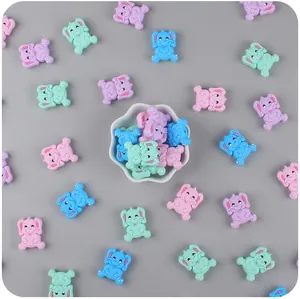Macro view of cartoon elephant silicone beads in assorted pastel colors for baby DIY teethers