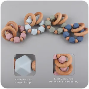 Anello da dentizione per neonati con cerchi in faggio e perline in silicone colorato