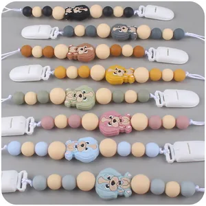 Silikon-Schnullerketten-Set mit Cartoon-Hunde-Motiven in verschiedenen Pastellfarben