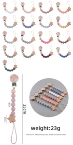 Detailed view of 17 colorful beech wood and silicone bead pacifier clip sets with dimensions