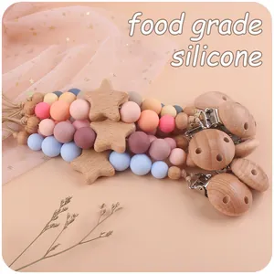 Catenella per ciuccio in legno di faggio con stella e perline in silicone colorato