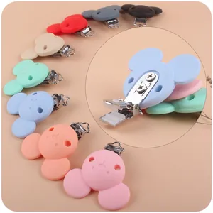 Silicone baby pacifier clips in various colors with cute cartoon animal character design