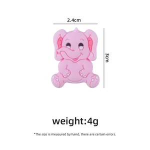 Pink cartoon elephant silicone baby teether accessory with dimensions 2.4cm by 3cm