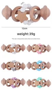 Detail view of beech wood baby rattle with silicone beads and specific dimensions shown