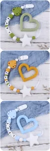 Detailed set of silicone baby pacifier clips with leaf, heart and star teethers
