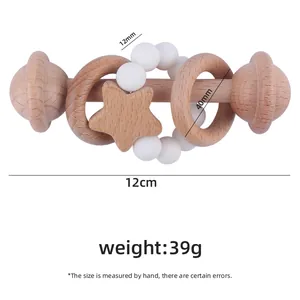 Beech wood baby rattle with white silicone beads and star pendant for teething
