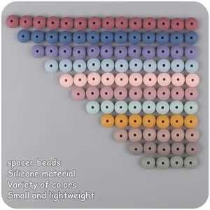 Macro shot of colorful silicone spacer beads in soft pastel tones for DIY jewelry