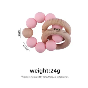 Pink silicone and beech wood baby teething ring with 15mm beads and 40mm rings