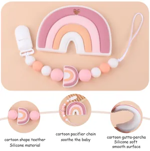 Close-up of soft macaron silicone baby teething toy and smooth pacifier clip set