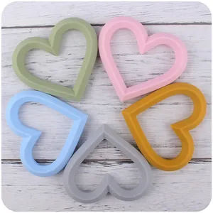 Five-piece set of heart-shaped silicone baby teethers in assorted pastel colors