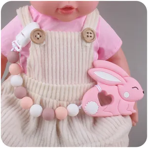 Siliconen bijtringset met roze konijn en kralen speenketting voor baby's op grijze basis