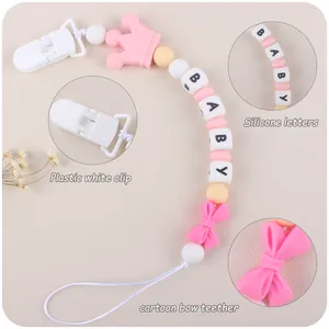 Pink crown silicone baby pacifier clip with colorful beads and butterfly teether toy
