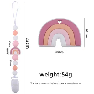 Silicone baby teether set with pacifier clip and rainbow teething toy in Morandi colors