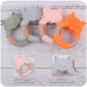 Détail des anneaux de dentition en silicone et hêtre en forme de renard, quatre couleurs