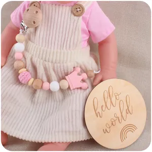 Pink and white silicone baby pacifier clip with beech wood bear clip and crown pendant