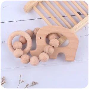 Set de dentition pour bébé en bois de hêtre avec un éléphant et un anneau de perles en bois