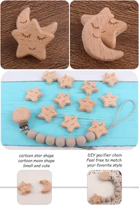 DIY baby pacifier clip kit with beech wood star and moon smiley beads and silicone beads