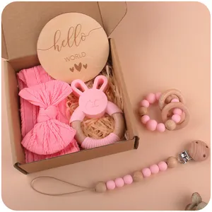 Pink silicone bunny teether set with milestone disc and bow headband in gift box