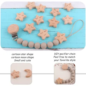 DIY baby pacifier clip set with beech wood star and moon shapes and silicone beads