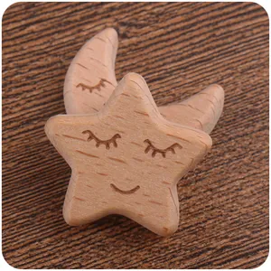 Star and moon shaped beech wood teething beads with cute smiling faces for DIY baby crafts