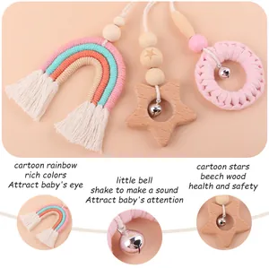 Détails du hochet étoile en hêtre et pendentifs arc-en-ciel pour portique bébé