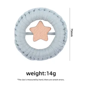 Blue cotton woven baby teether with wooden star ring, 75mm diameter and 14g weight