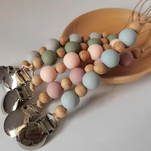 Silicone pacifier clips with wood beads in macaron colors for infant teething relief