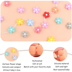 Detailed macro view of soft silicone flower beads showing DIY holes and flexibility