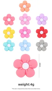 Macro view of 23mm silicone flower teethers in 10 colors for DIY pacifier clips