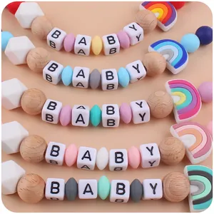 Siliconen speenkoorden met regenbooghangers en houten kralen voor baby's