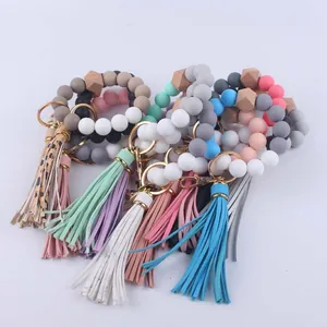 Silikonperlen Schlüsselanhänger Armband mit Holzperle und bunten Fransenanhängern