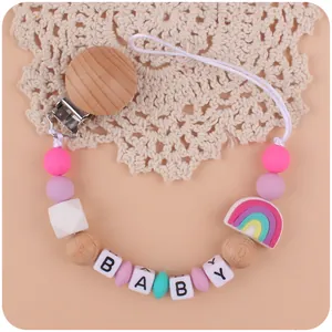 Baby speenkoord met roze siliconen kralen, regenboog en houten clip