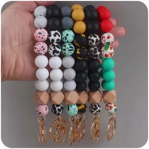 Handheld silicone bead wristlet keychain set featuring leopard and holiday patterns