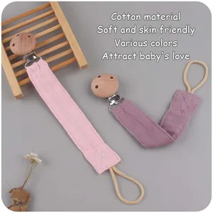 Rosa und lila Schnullerketten aus Baumwolle mit Buchenholzclip für Babys und Kleinkinder